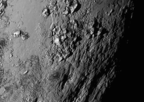 First Ever High Resolution View of Pluto's Surface